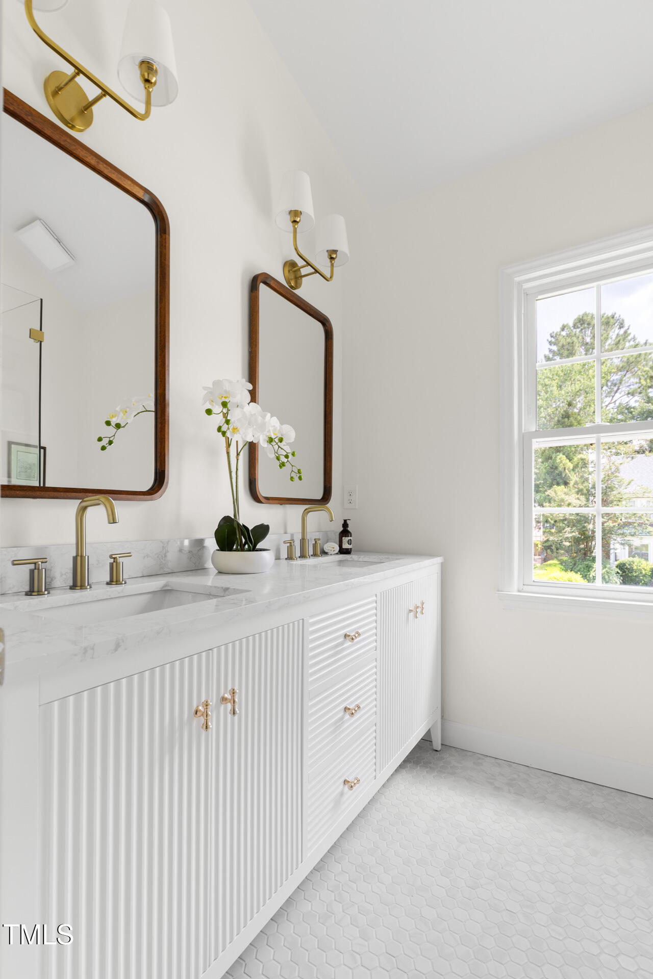 16 Cedar Hill Drive Durham, NC 27713 - Photo 25 of 35 a bathroom with a double vanity sink and a mirror