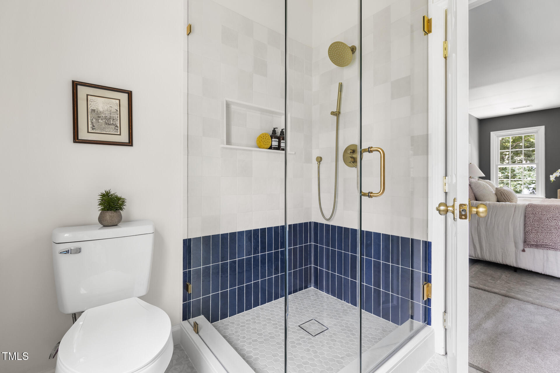 16 Cedar Hill Drive Durham, NC 27713 - Photo 27 of 35 a bathroom with a shower a toilet and a sink