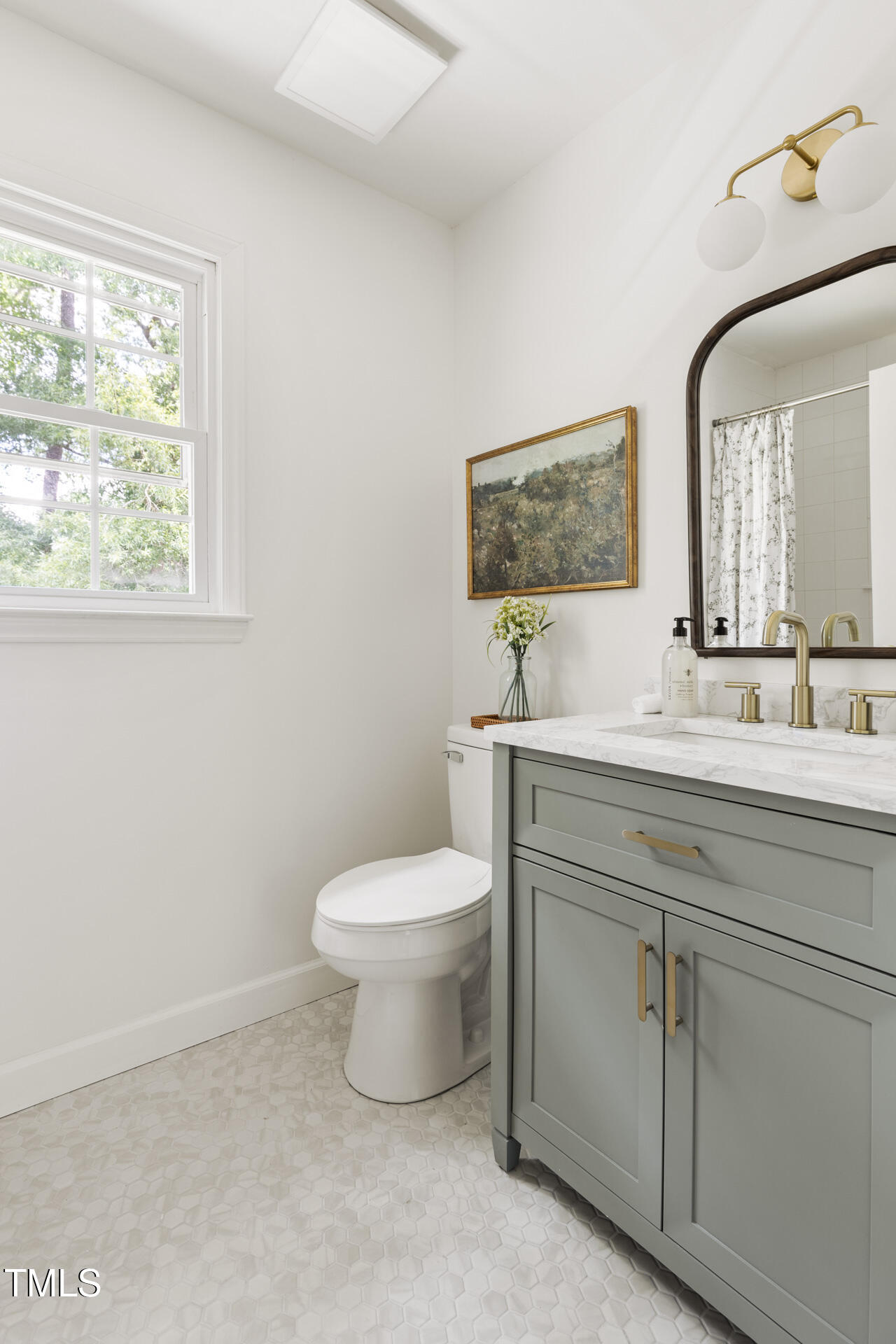 16 Cedar Hill Drive Durham, NC 27713 - Photo 29 of 35 a bathroom with a toilet sink and mirror
