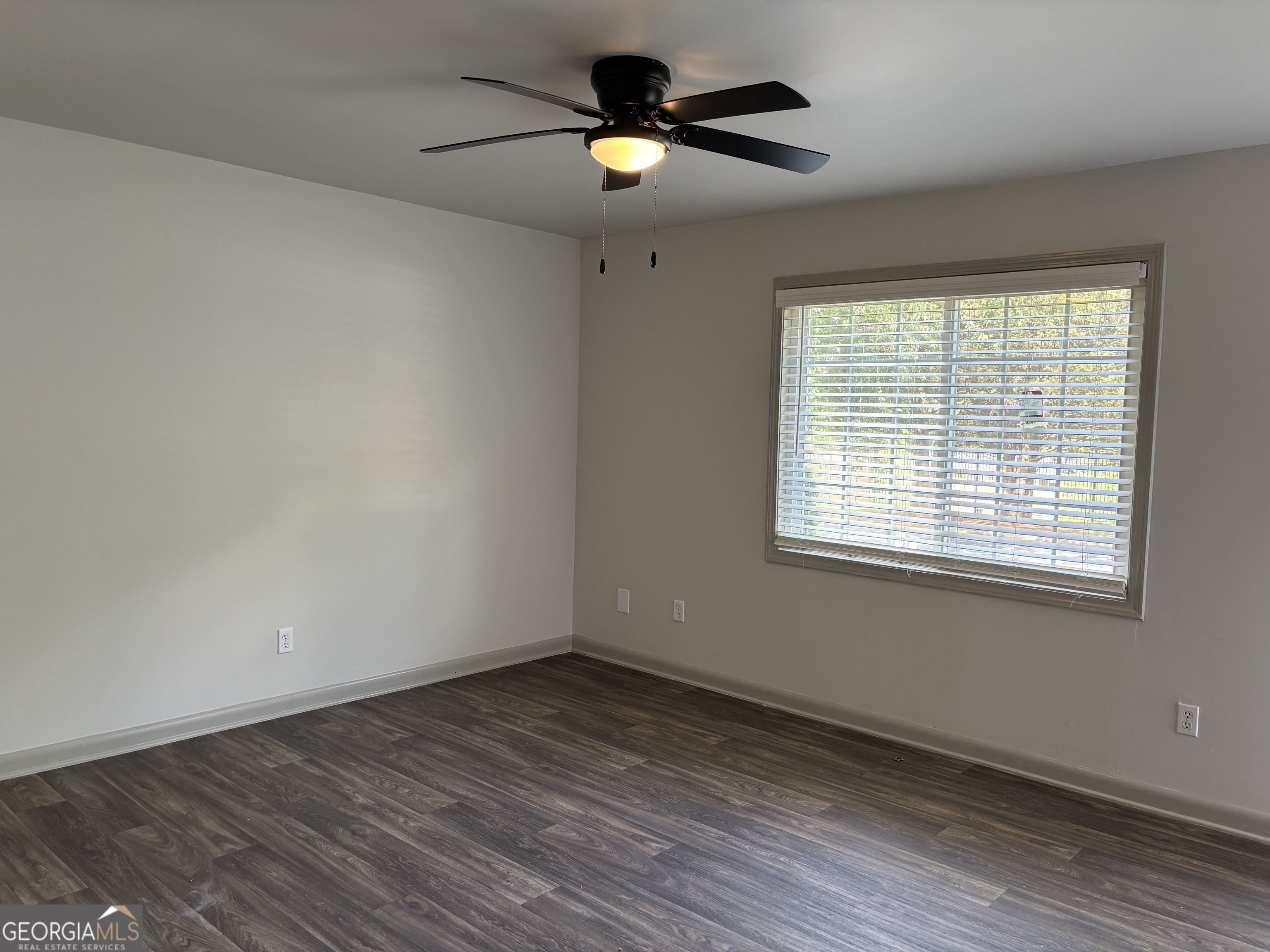 1609 Line Street Decatur, GA 30032 - Photo 3 of 15 a view of empty room with wooden floor and fan