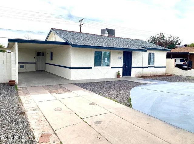a front view of a house with a garage