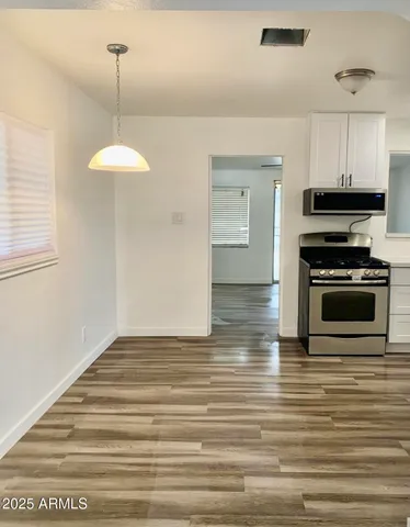 a view of a kitchen from the center