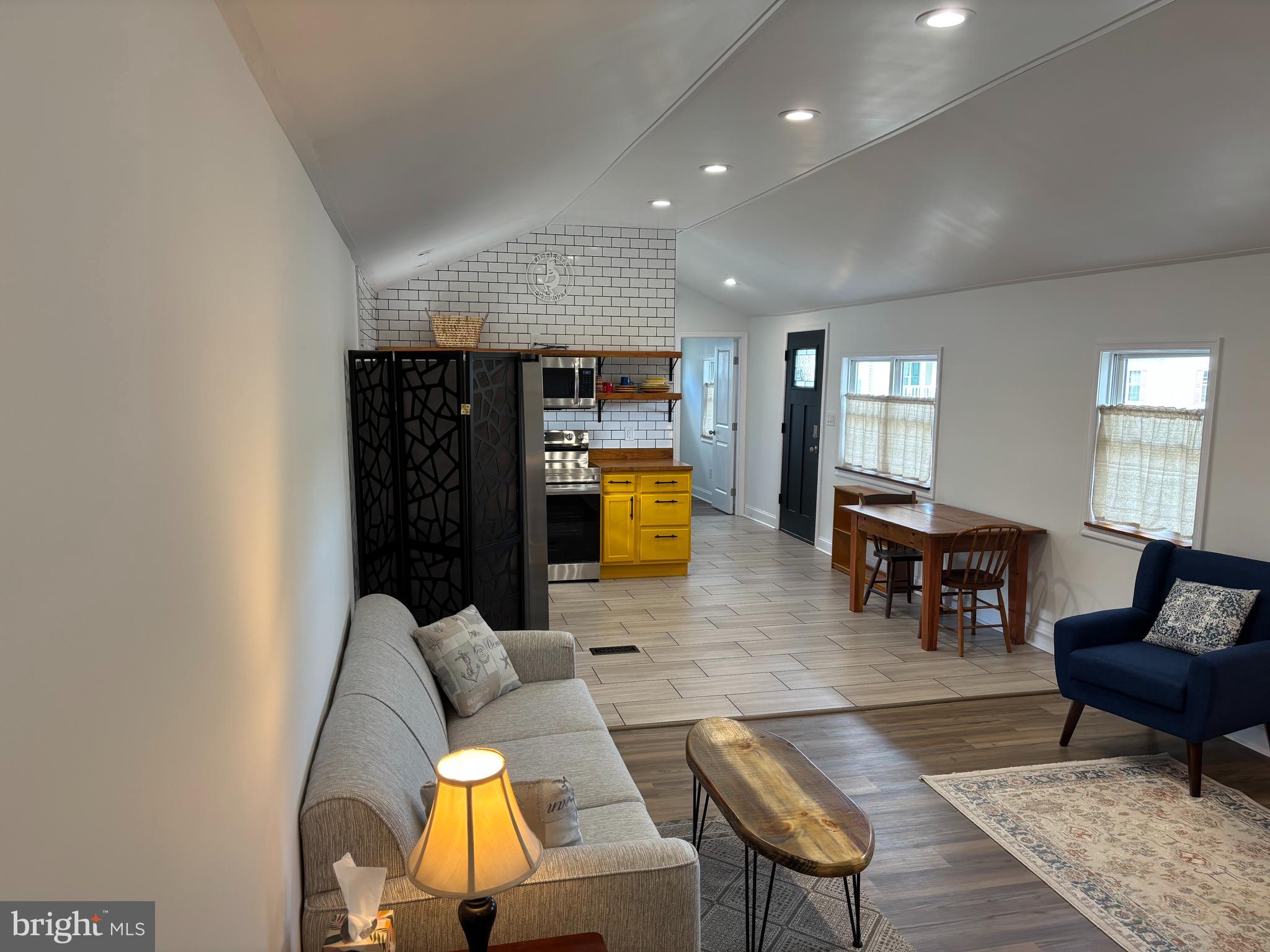 31752 Siham Road Lewes, DE 19958 - Photo 13 of 18 a living room with furniture and a wooden floor