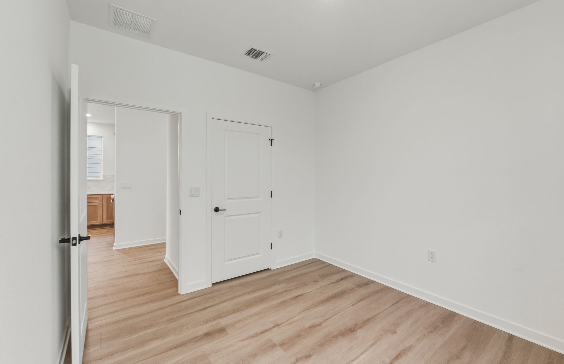 207 Smokestack Lane Georgetown, TX 78633 - Photo 15 of 21 a view of a room with wooden floor