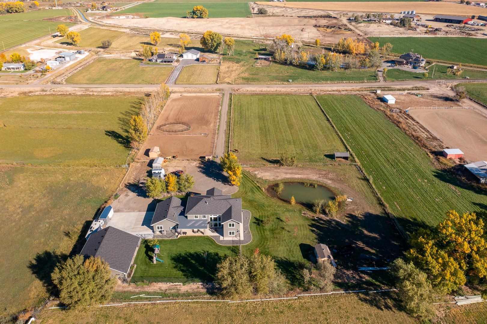 2041 J J 1/2 Road Fruita, CO 81521 - Photo 42 of 42 an aerial view of a building with outdoor space
