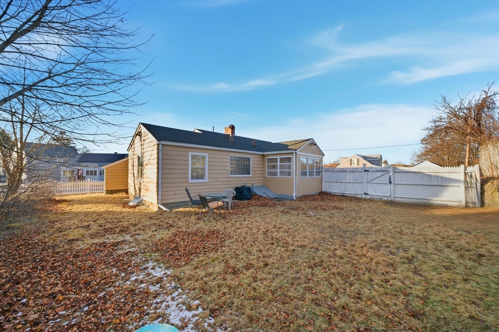 70 Farrell Road Lynn, MA 01905 - Photo 20 of 22 a backyard of a house with table and chairs