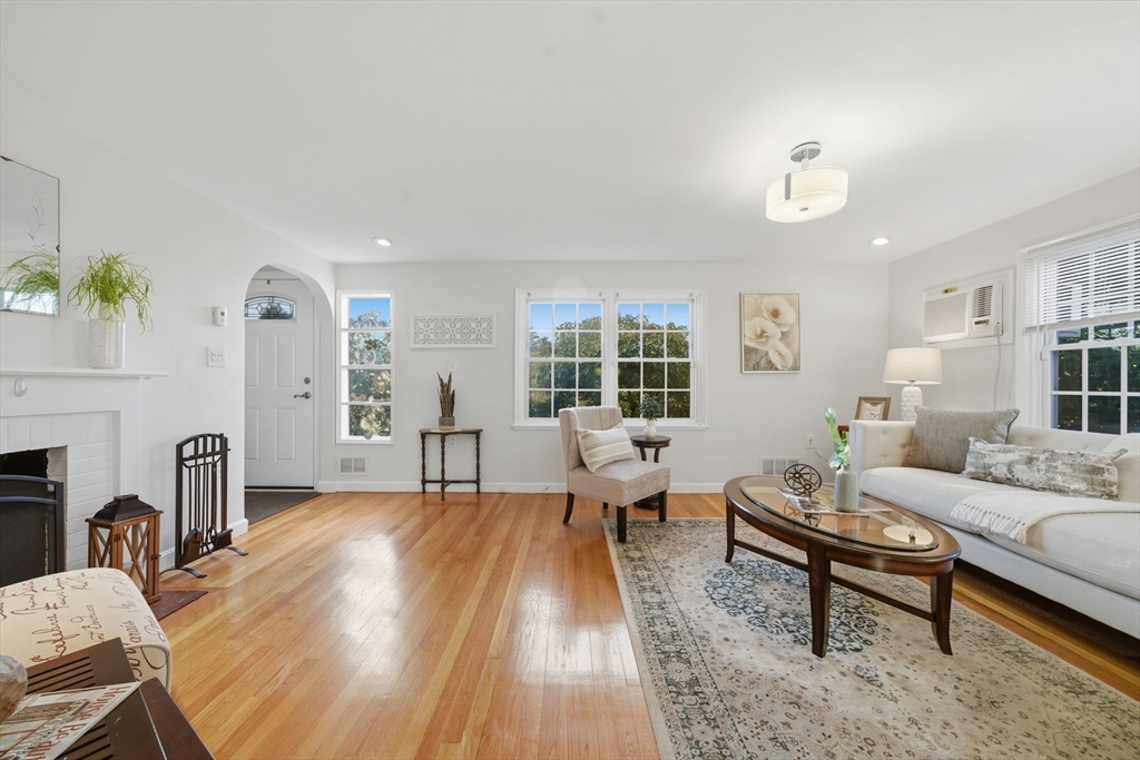 70 Farrell Road Lynn, MA 01905 - Photo 2 of 22 a living room with furniture and a fireplace