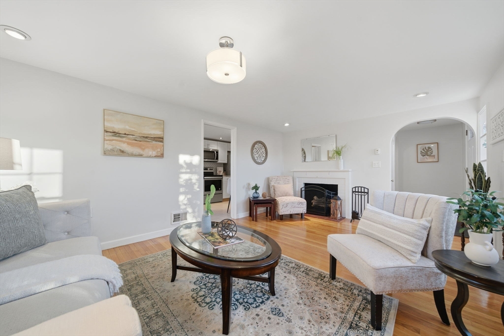 70 Farrell Road Lynn, MA 01905 - Photo 3 of 22 a living room with furniture and a fireplace
