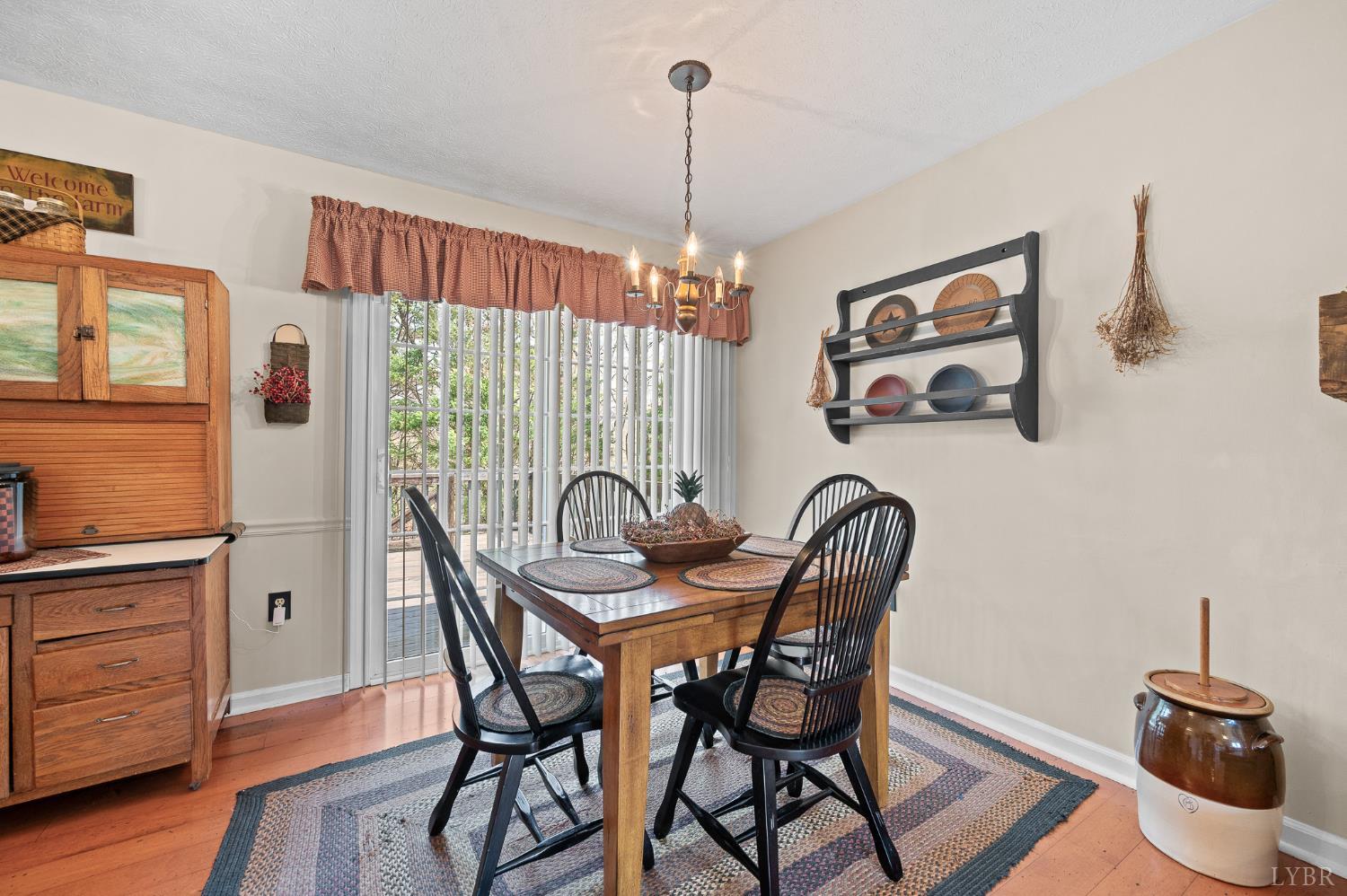 1136 Coolbrook Road Bedford, VA 24523 - Photo 12 of 46 a dining room with furniture and window