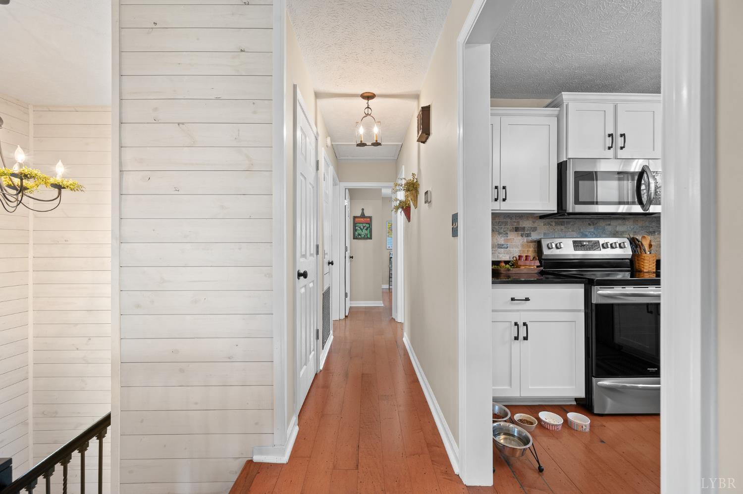 1136 Coolbrook Road Bedford, VA 24523 - Photo 16 of 46 a view of a kitchen from the hallway