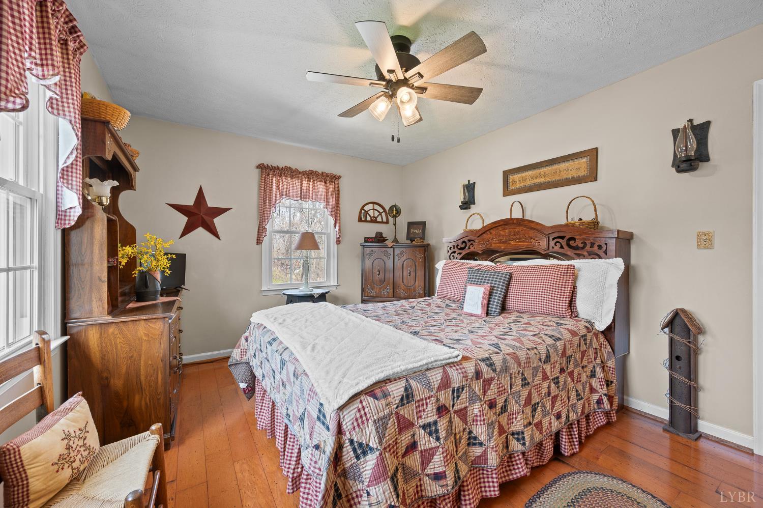 1136 Coolbrook Road Bedford, VA 24523 - Photo 21 of 46 a bedroom with a bed and wooden floor