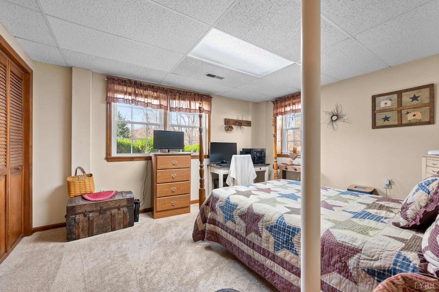 1136 Coolbrook Road Bedford, VA 24523 - Photo 30 of 46 a bedroom with a bed and large windows