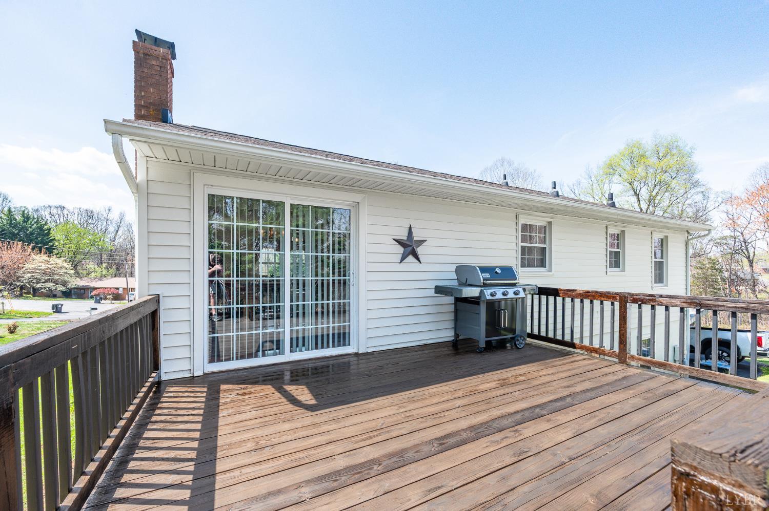 1136 Coolbrook Road Bedford, VA 24523 - Photo 36 of 46 a view of a roof deck with wooden floor and fence