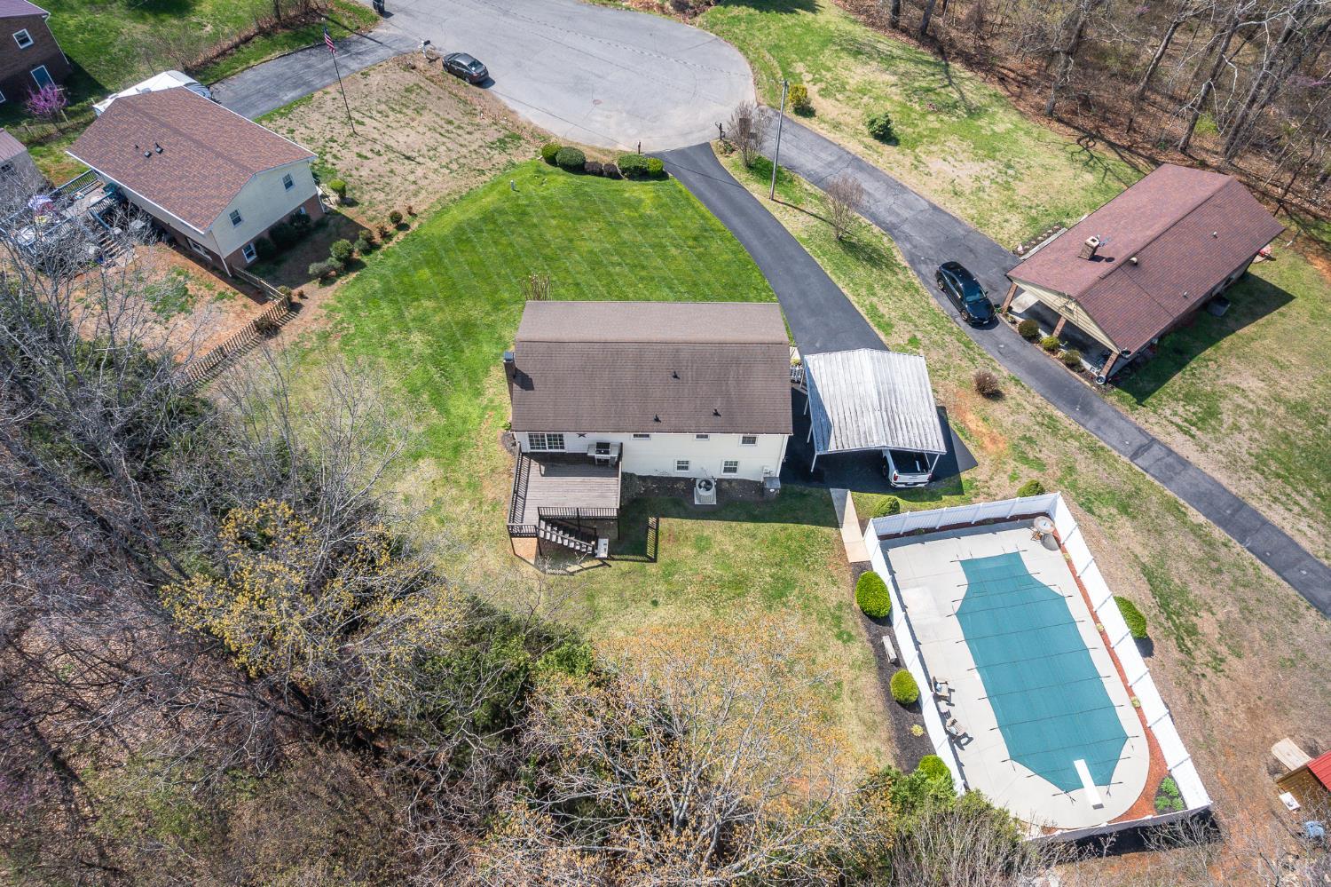 1136 Coolbrook Road Bedford, VA 24523 - Photo 41 of 46 an aerial view of a house with garden space and a swimming pool