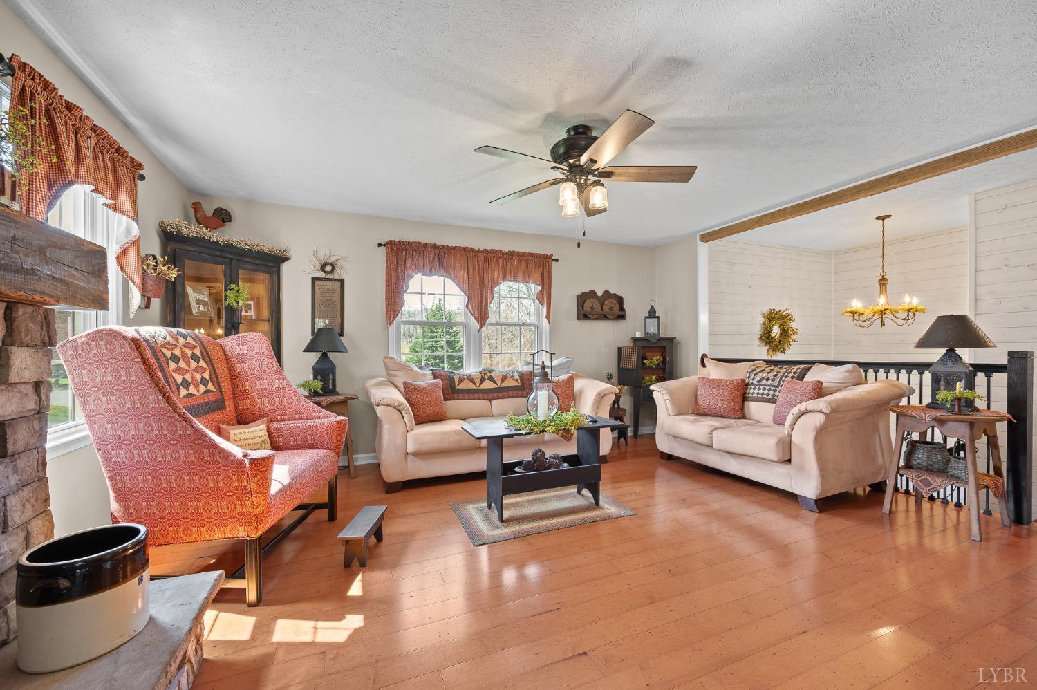 1136 Coolbrook Road Bedford, VA 24523 - Photo 9 of 46 a living room with furniture and a large window