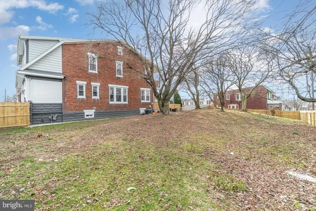 a brick building view with outdoor space