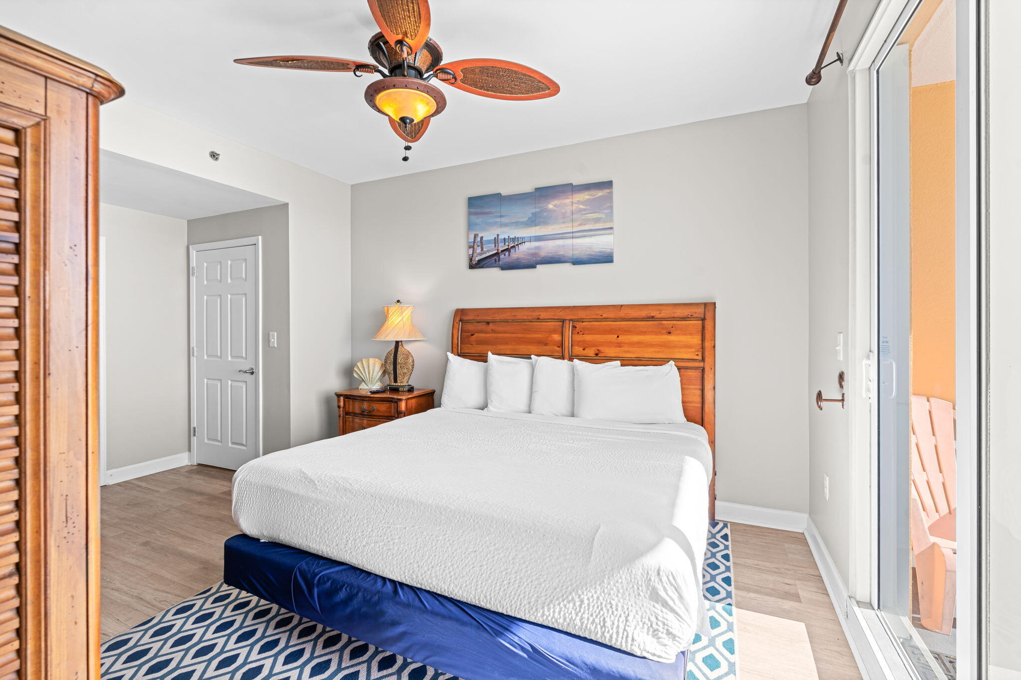 17729 Front Beach Road, Unit 702E Panama City Beach, FL 32413 - Photo 18 of 53 a bedroom with a bed and a window