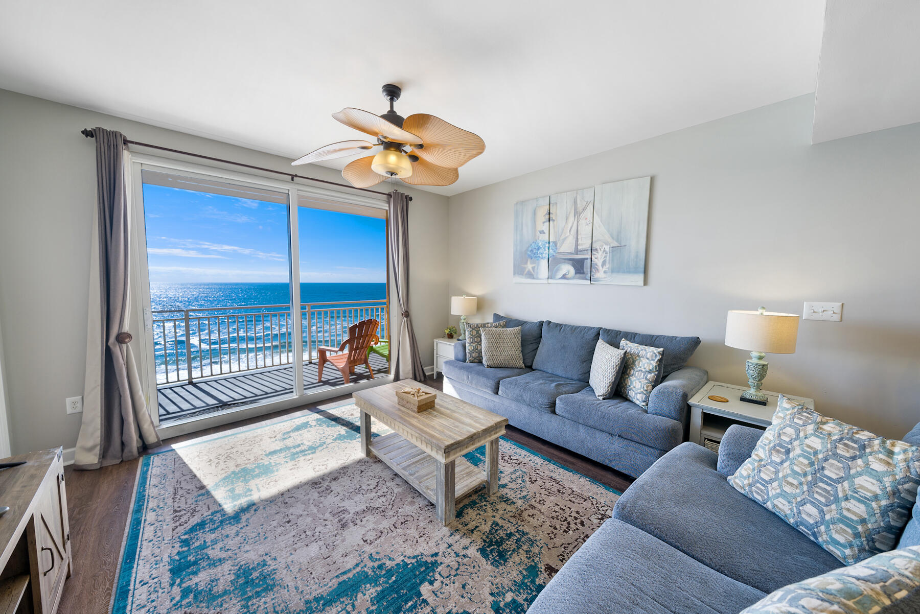 17729 Front Beach Road, Unit 702E Panama City Beach, FL 32413 - Photo 2 of 53 a living room with furniture and a large window