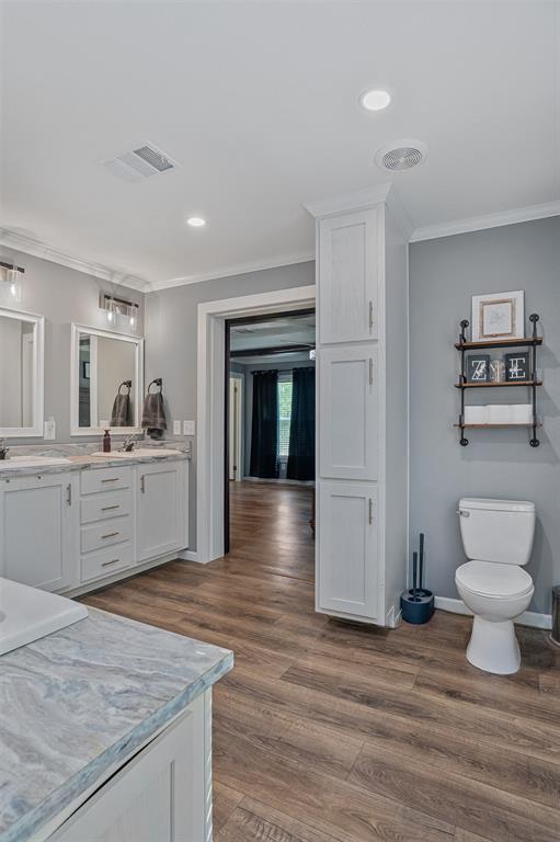 339 Cycle Plant Road Benton, LA 71006 - Photo 18 of 25 a kitchen with a sink and a refrigerator