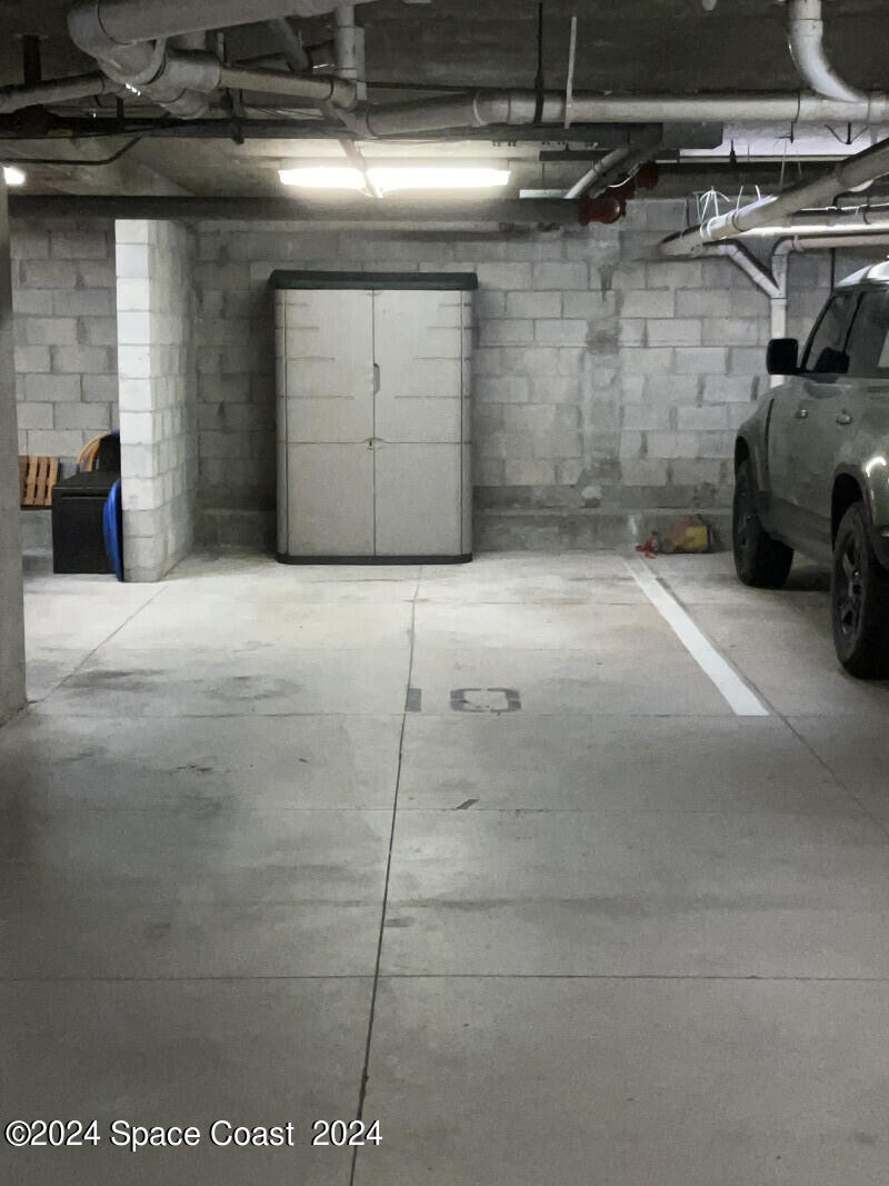 2035 Florida A1A, Unit 201 Satellite Beach, FL 32937 - Photo 7 of 12 a view of parking garage