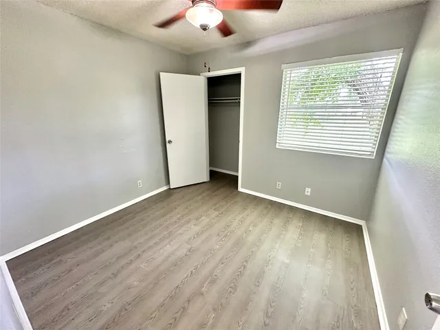 a view of kitchen and kitchen with wooden floor