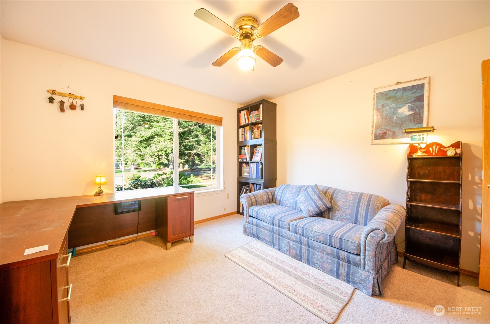 8203 177th Lane Southwest Rochester, WA 98579 - Photo 11 of 30 a living room with furniture and a large window