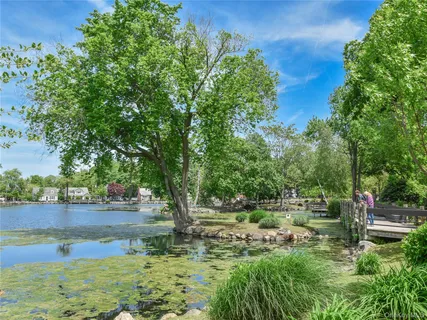 a view of path along with retail shop and buildings