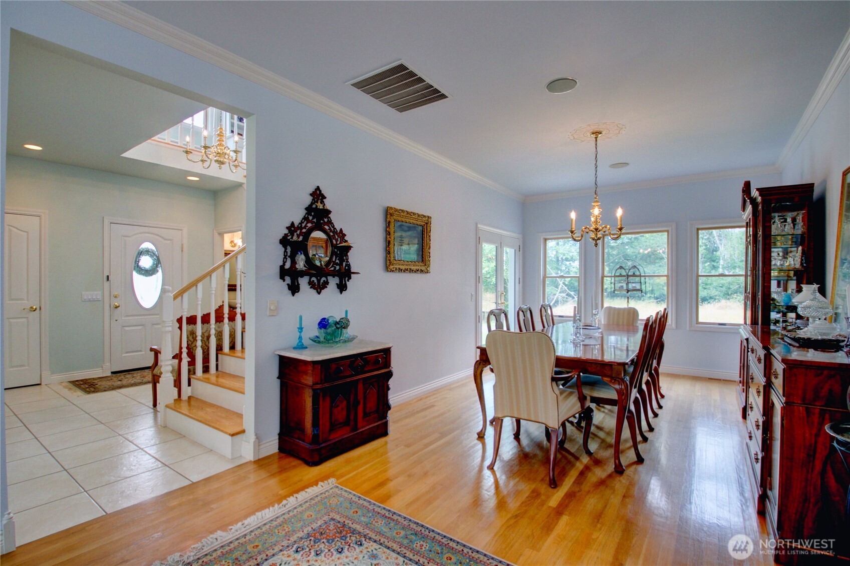 2950 Aldergrove Road Ferndale, WA 98248 - Photo 10 of 39 a view of a dining room with furniture window and wooden floor