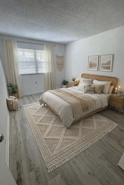 2075 Cornwall East, Unit 2075 Boca Raton, FL 33434 - Photo 16 of 32 a bedroom with a bed and window