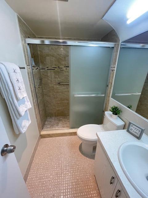 2075 Cornwall East, Unit 2075 Boca Raton, FL 33434 - Photo 20 of 32 a bathroom with a sink and a shower