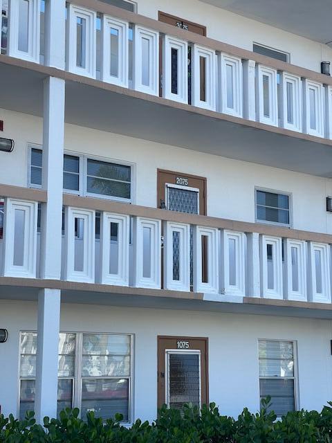 2075 Cornwall East, Unit 2075 Boca Raton, FL 33434 - Photo 31 of 32 a view of front door of house