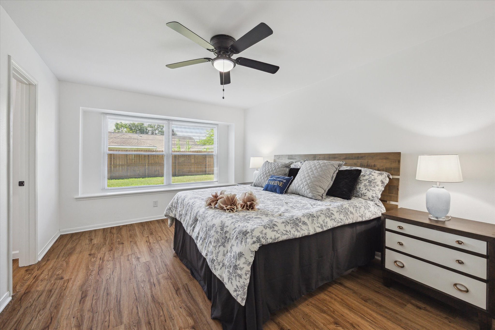 2231 Lexford Lane Houston, TX 77080 - Photo 14 of 23 a bedroom with bed and two window