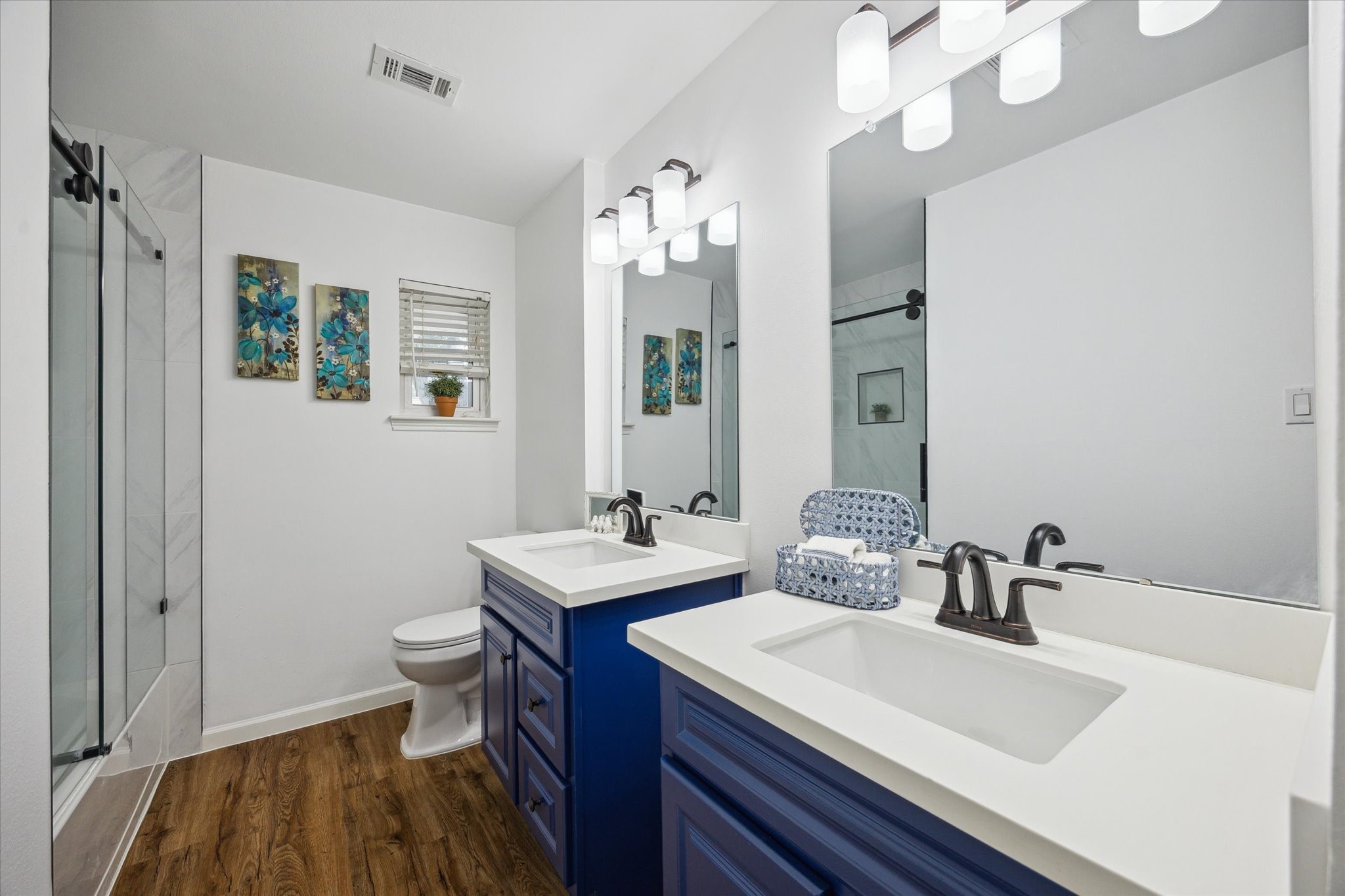 2231 Lexford Lane Houston, TX 77080 - Photo 20 of 23 a bathroom with a sink and a mirror