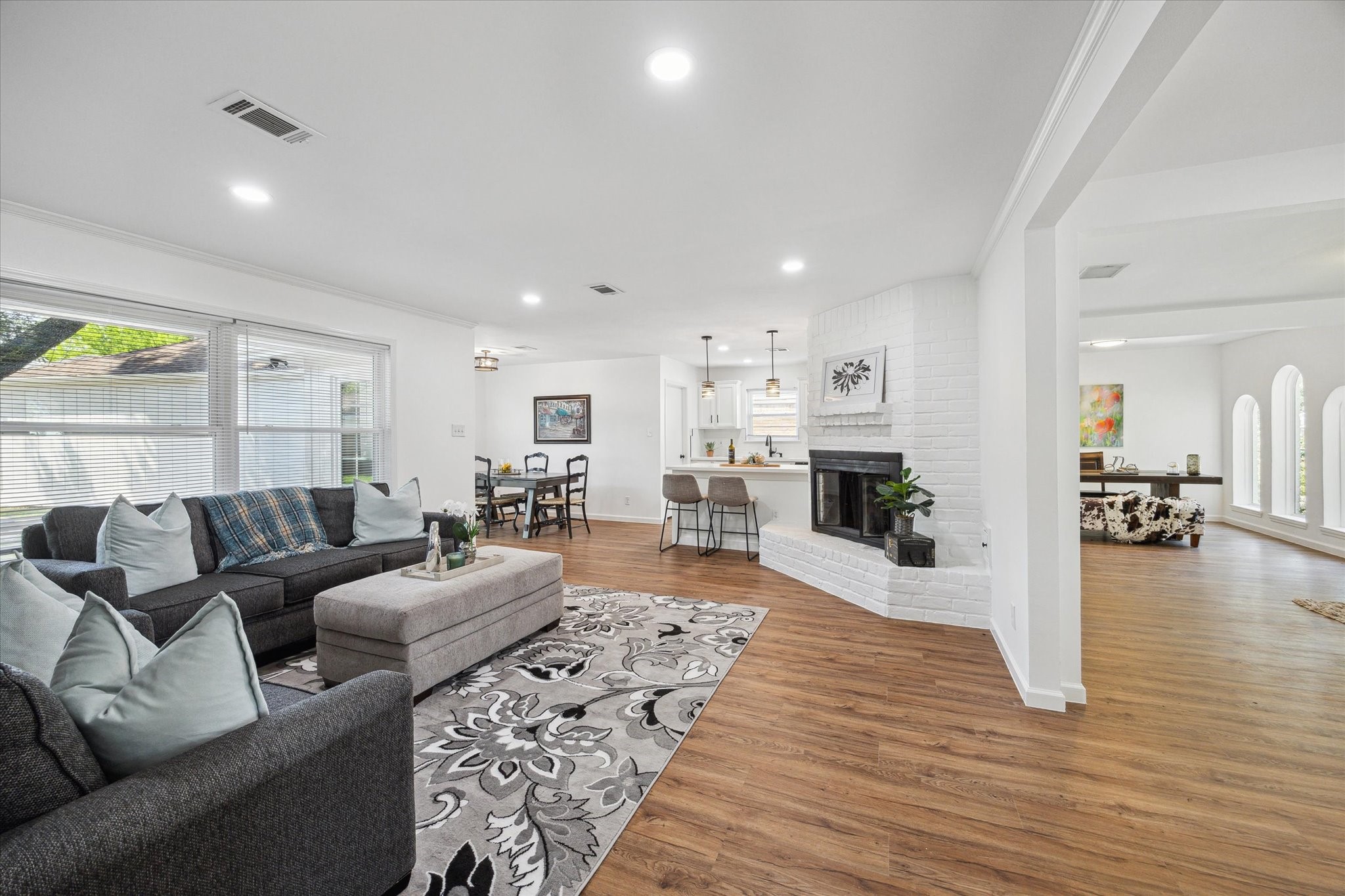 2231 Lexford Lane Houston, TX 77080 - Photo 9 of 23 a living room with furniture and a wooden floor