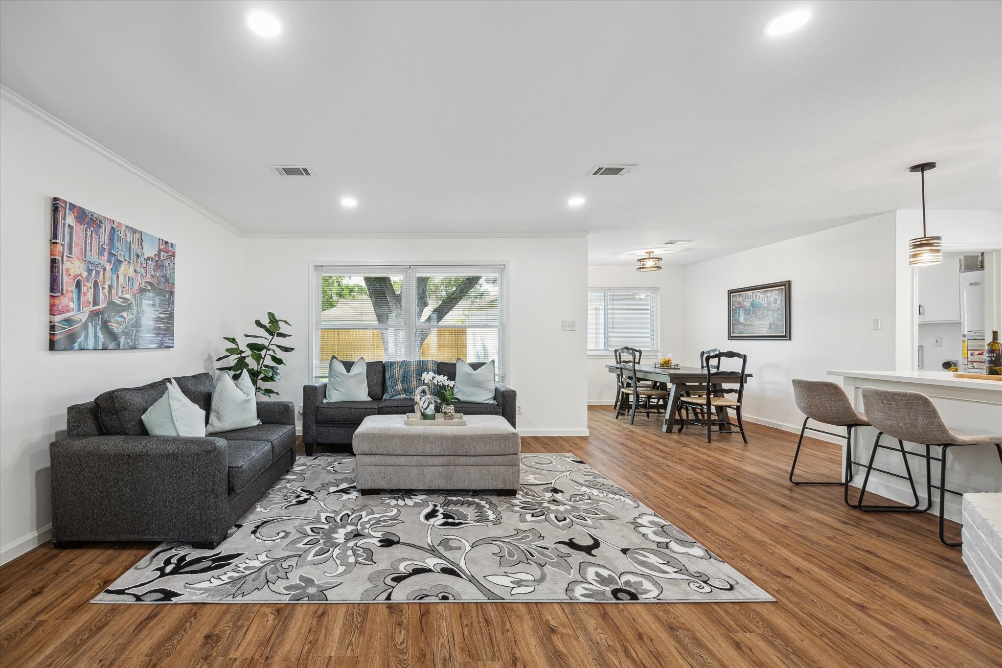 2231 Lexford Lane Houston, TX 77080 - Photo 10 of 23 a living room with furniture and a wooden floor