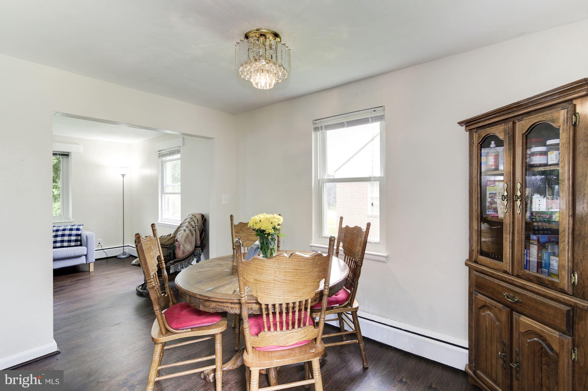 707 Silver Creek Road Baltimore, MD 21208 - Photo 8 of 30 a dining room with furniture and window