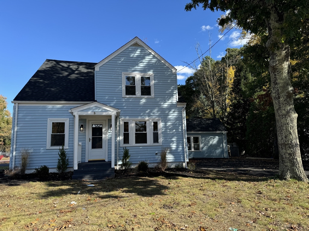 1099 South Main Street Bellingham, MA 02019 - Photo 1 of 20 a view of a house with a yard