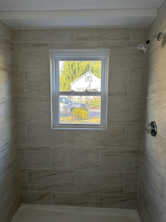 1099 South Main Street Bellingham, MA 02019 - Photo 12 of 20 a bathroom with a window