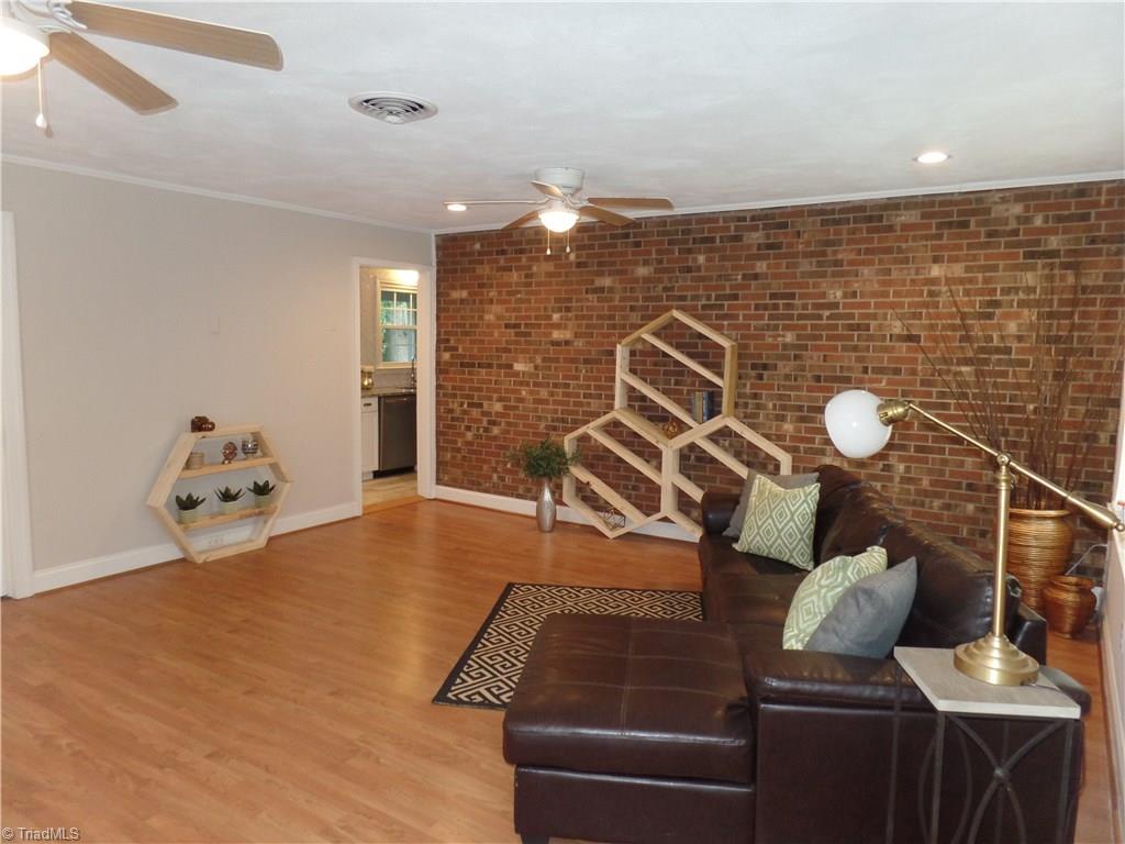 2995 Dillon Road Jamestown, NC 27282 - Photo 2 of 30 Den with Brick accent wall