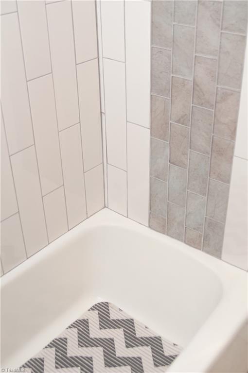 2995 Dillon Road Jamestown, NC 27282 - Photo 21 of 30 Tub Tiled to ceiling.