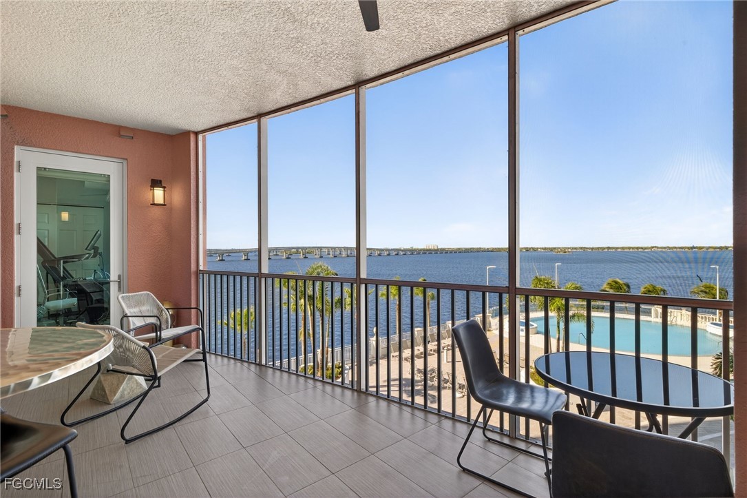 2743 First Street, Unit 502 Fort Myers, FL 33916 - Photo 29 of 39 a balcony with wooden floor