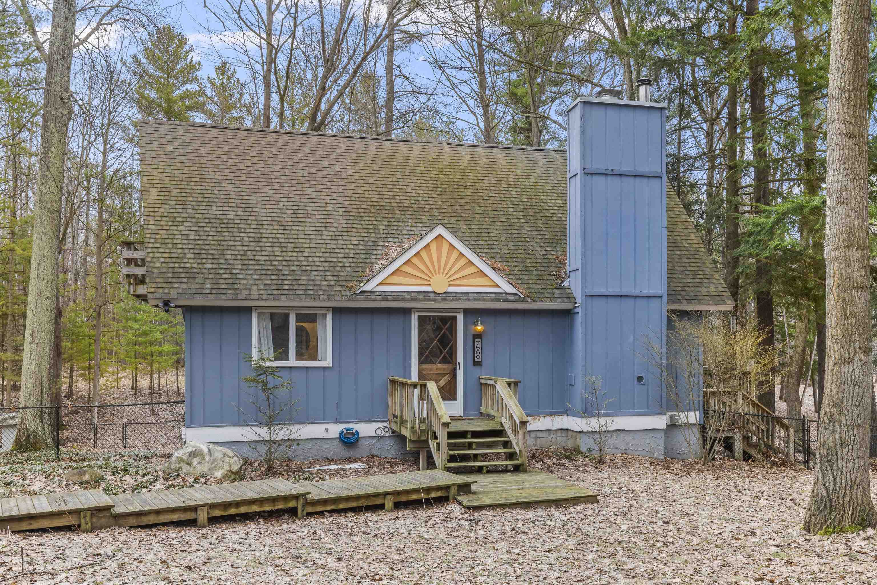 7560 Peaceful Valley Road Williamsburg, MI 49690 - Photo 1 of 48