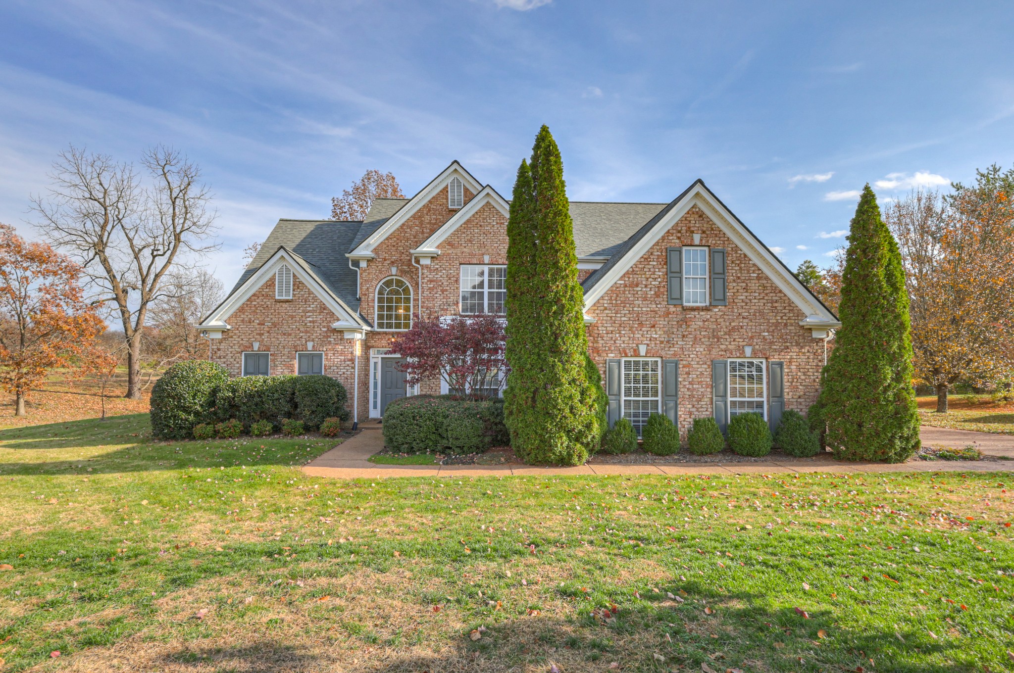 6331 Williams Grove Drive Brentwood, TN 37027 - Photo 1 of 58 a front view of a house with garden