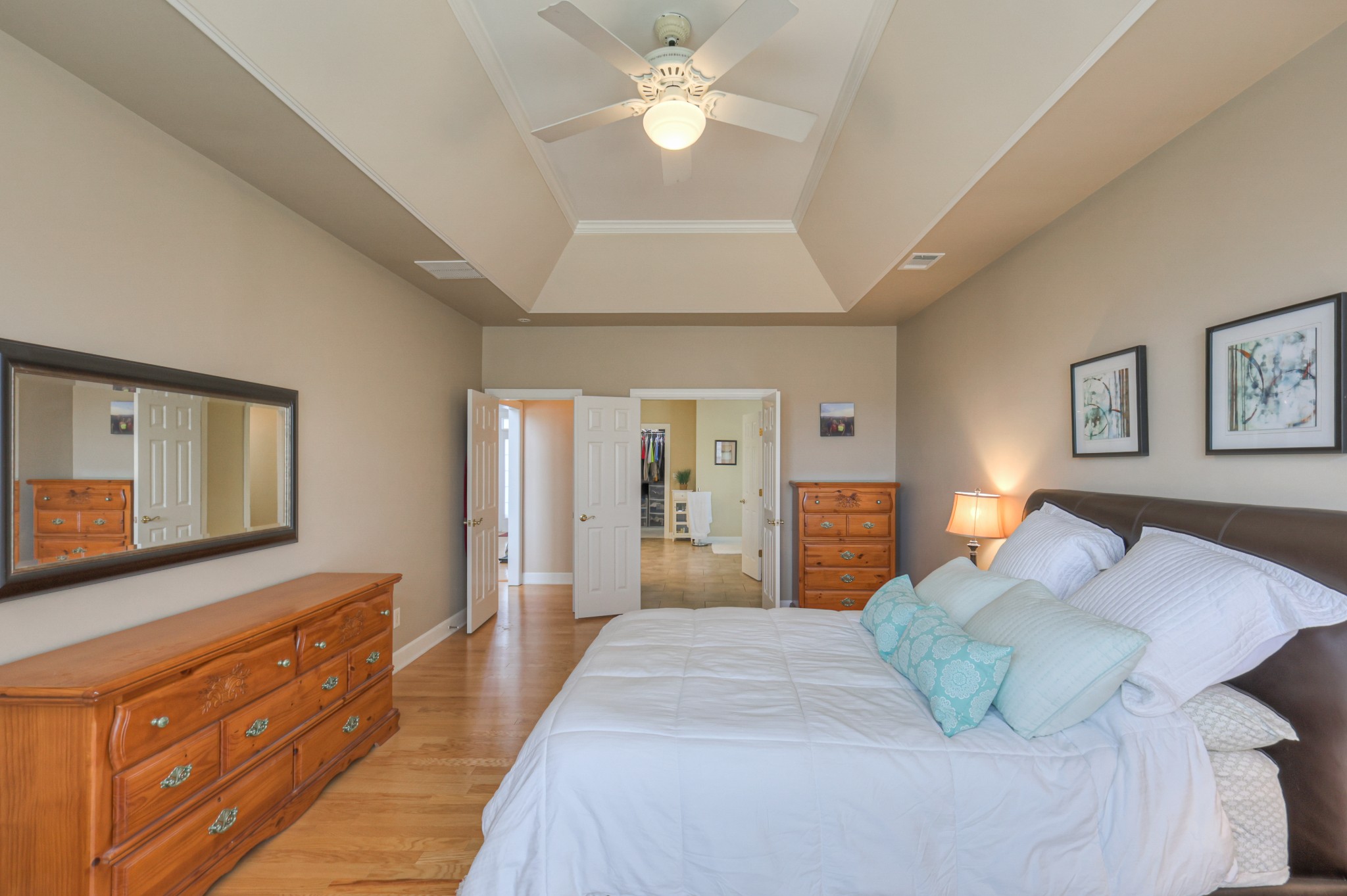 6331 Williams Grove Drive Brentwood, TN 37027 - Photo 13 of 58 a bedroom with a bed and a chandelier