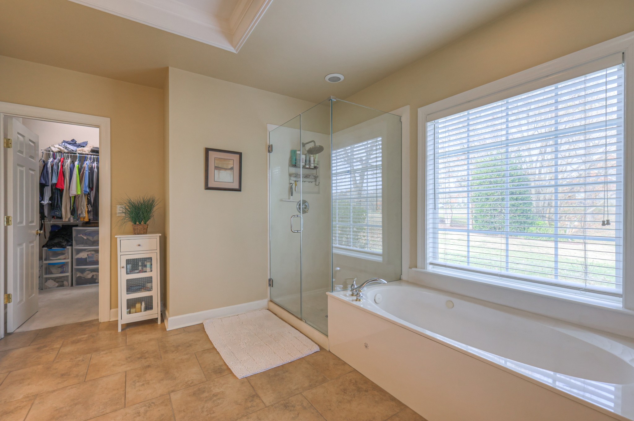 6331 Williams Grove Drive Brentwood, TN 37027 - Photo 16 of 58 a spacious bedroom with a bed and a window