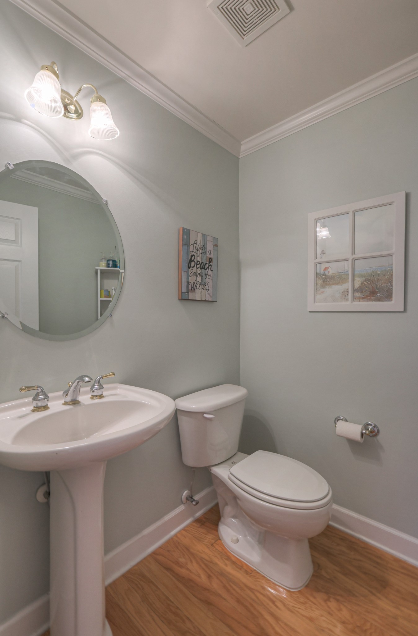 6331 Williams Grove Drive Brentwood, TN 37027 - Photo 34 of 58 a bathroom with a toilet a sink and mirror