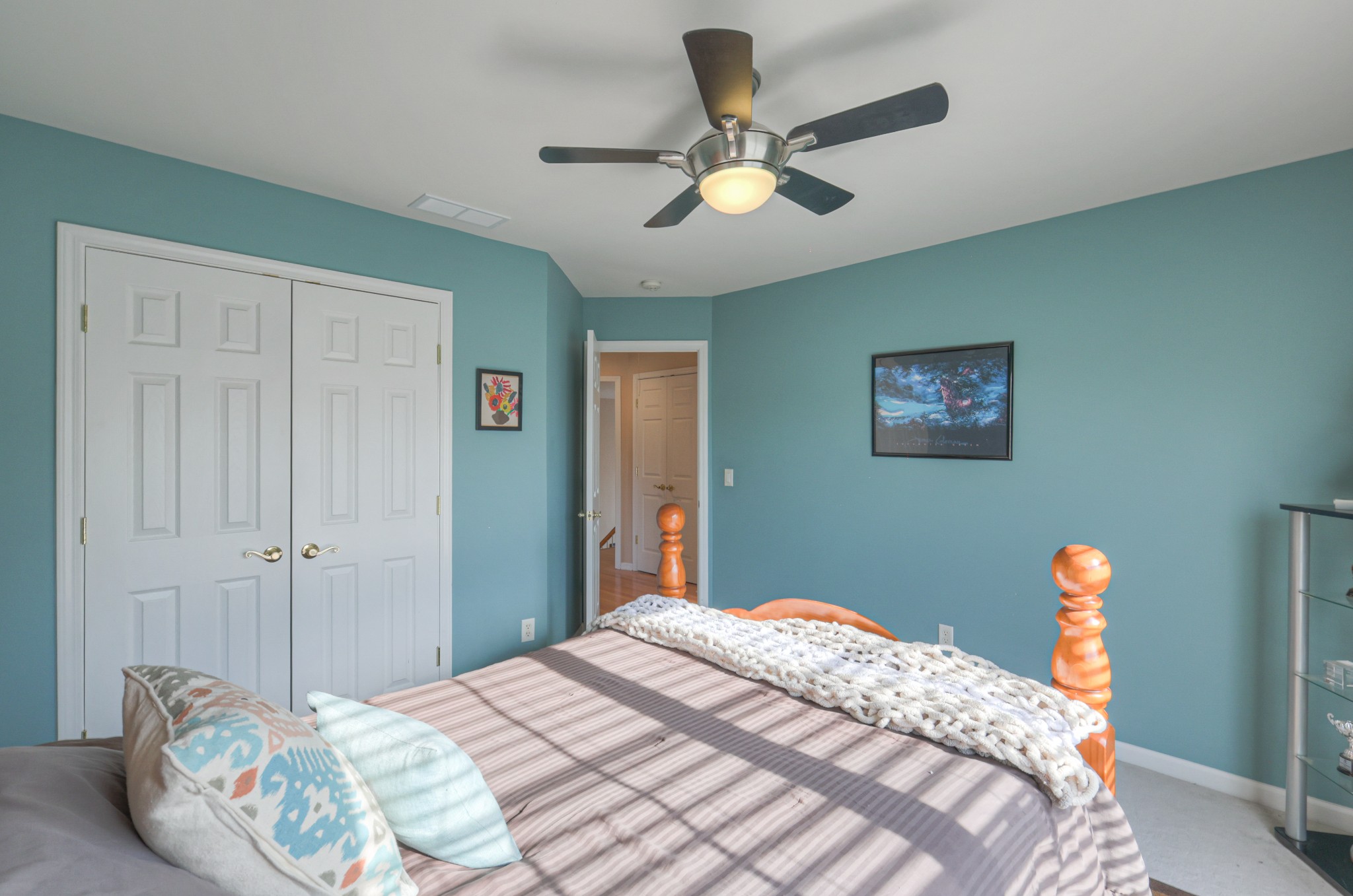 6331 Williams Grove Drive Brentwood, TN 37027 - Photo 42 of 58 a bedroom with bed and a chandelier