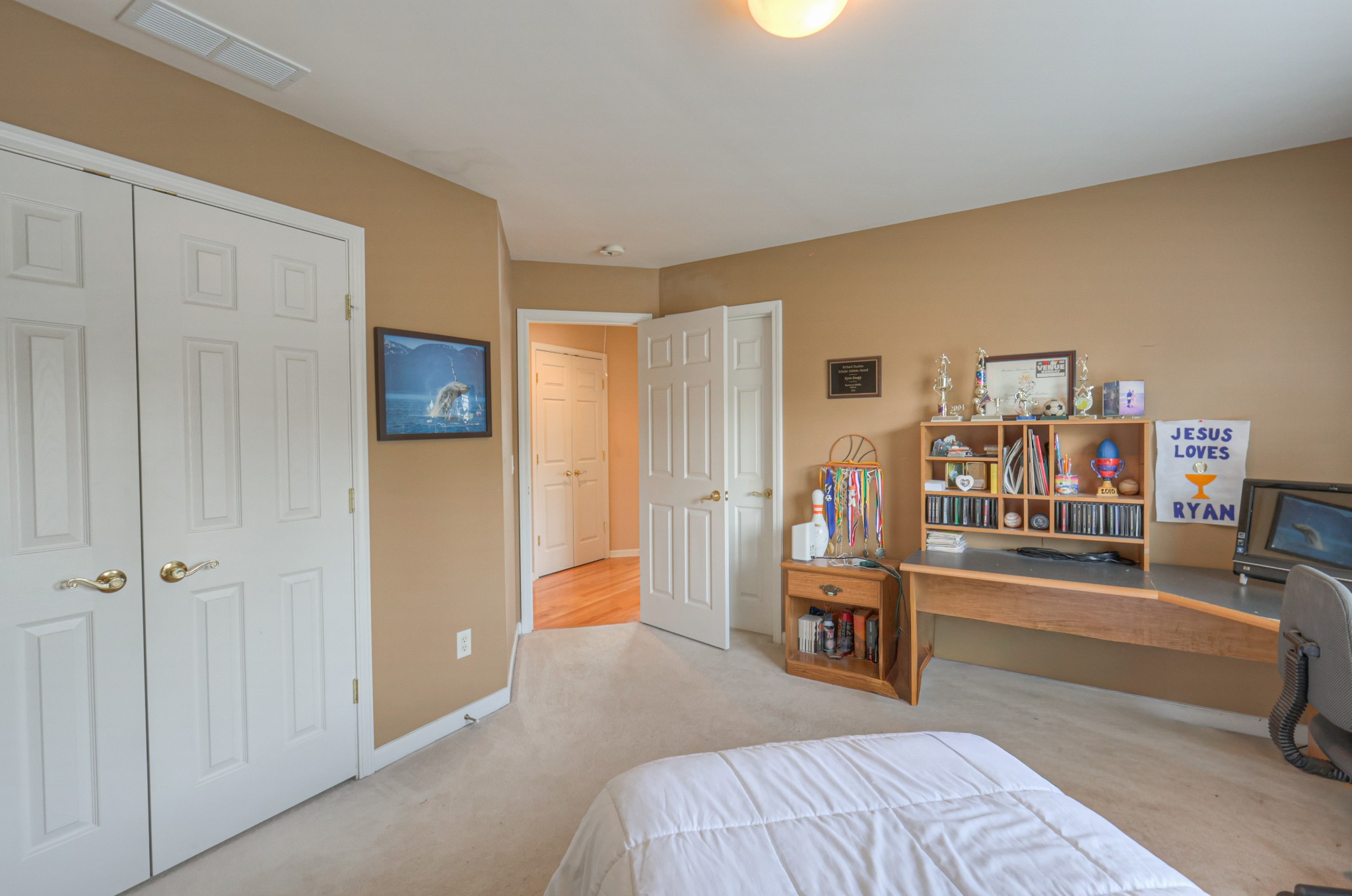 6331 Williams Grove Drive Brentwood, TN 37027 - Photo 48 of 58 a bedroom with furniture and a book shelf