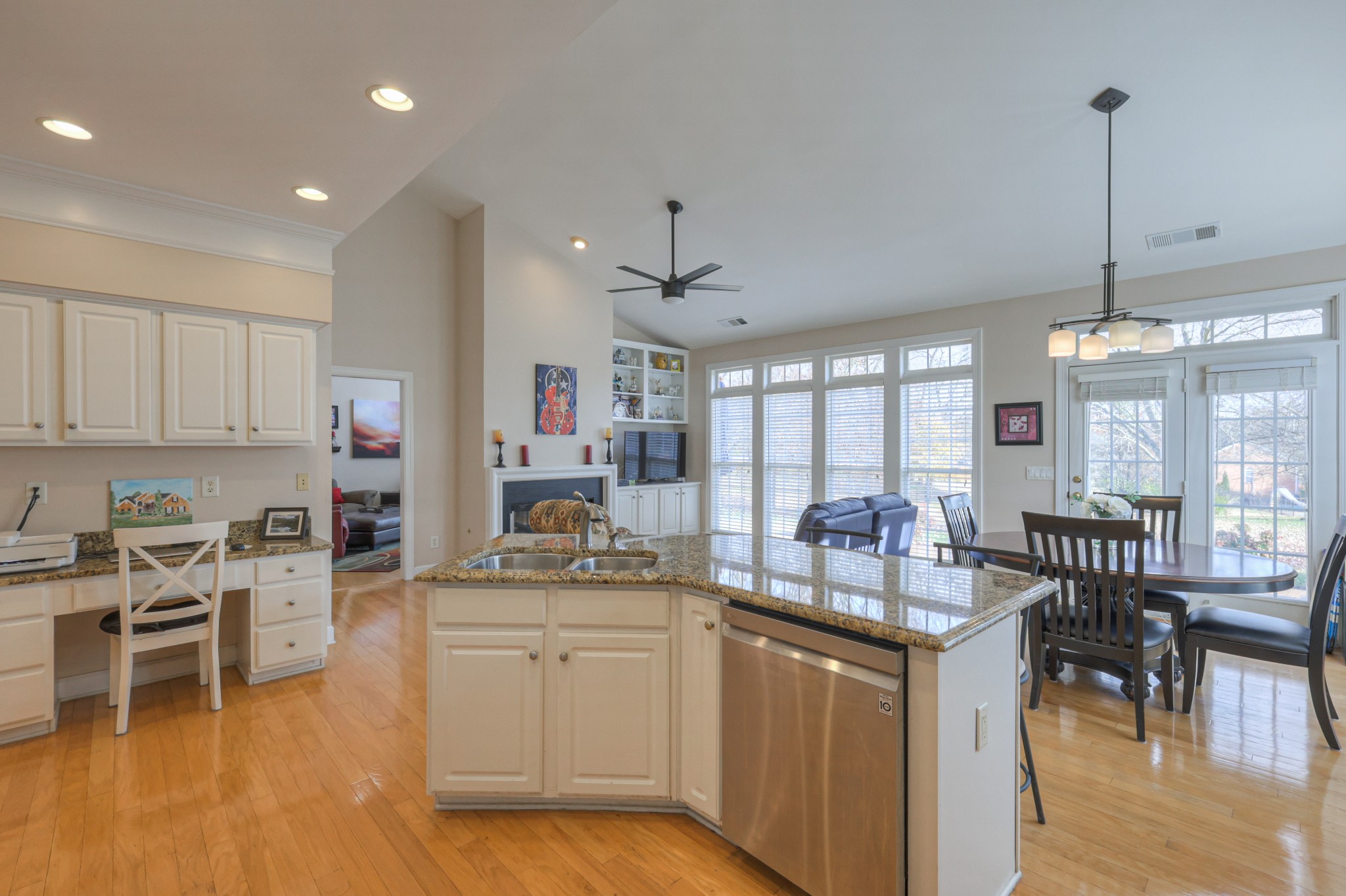 6331 Williams Grove Drive Brentwood, TN 37027 - Photo 5 of 58 a kitchen with stainless steel appliances granite countertop a stove and a wooden floors