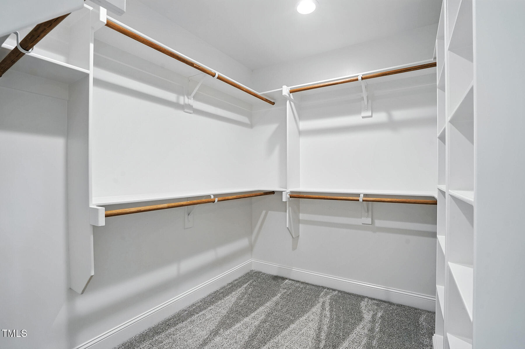 8708 Green Path Road Dunn, NC 28334 - Photo 23 of 31 a view of an empty walk in closet